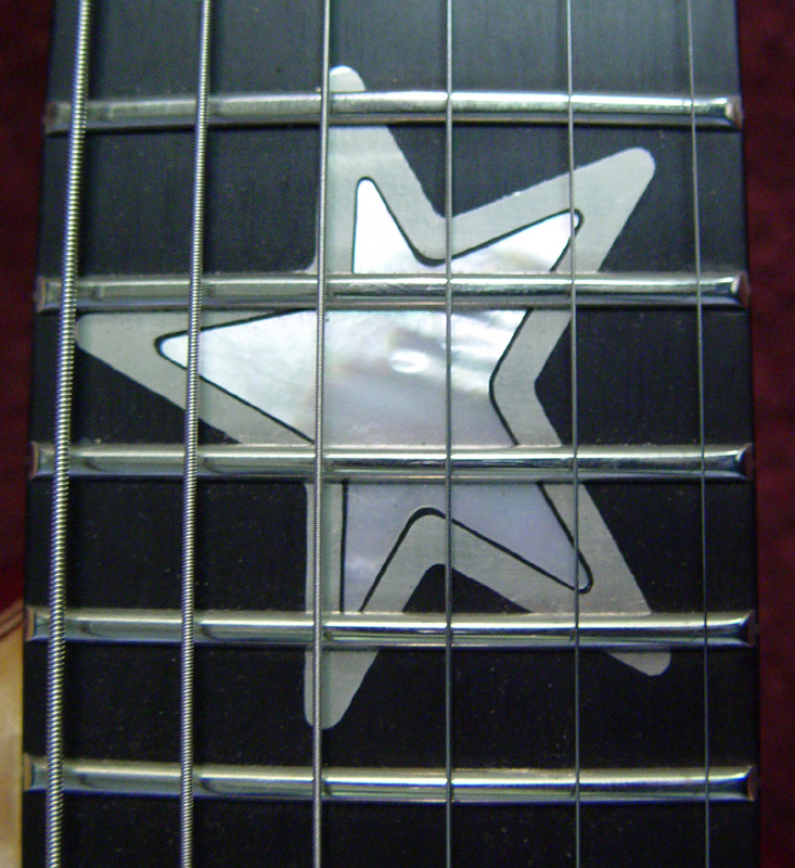 Fingerboard inlay