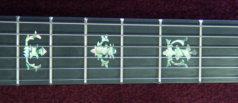 Fingerboard inlay